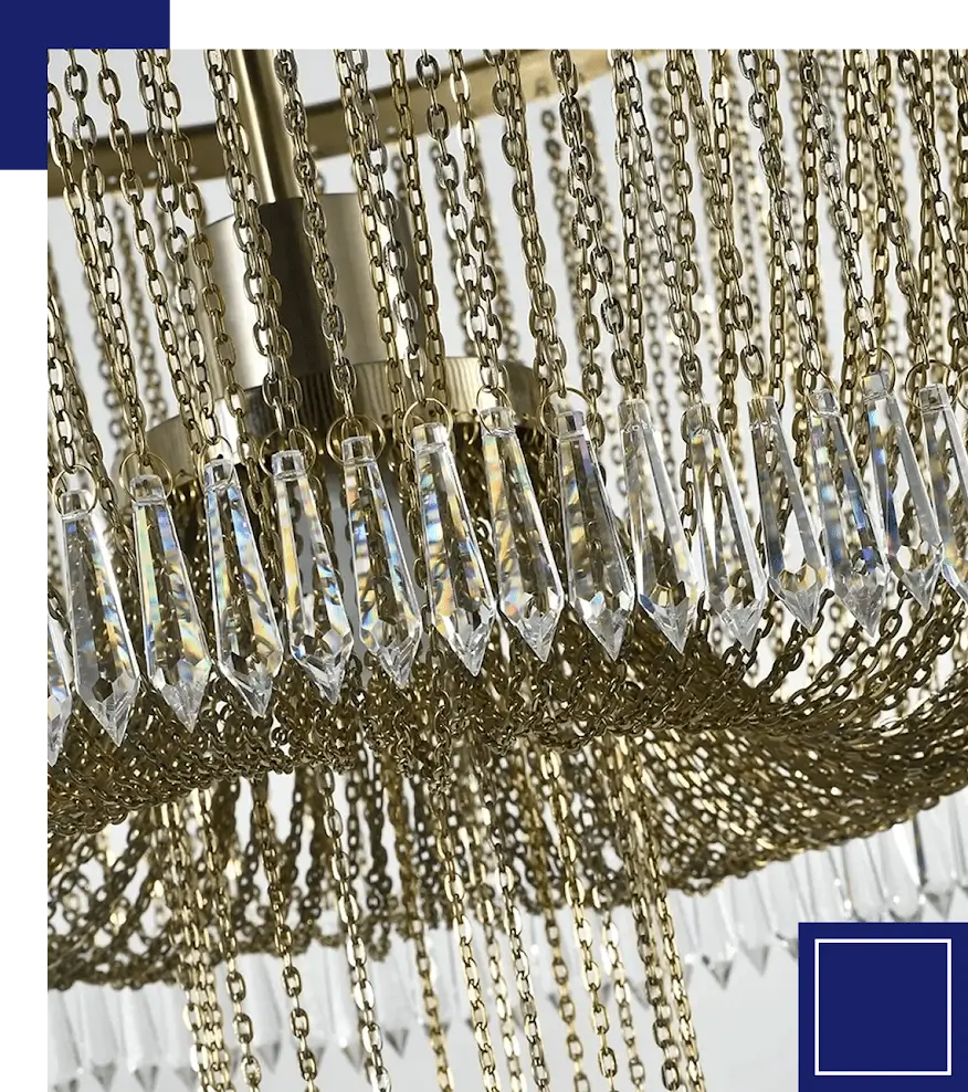 A close up of the chandelier with blue and white background